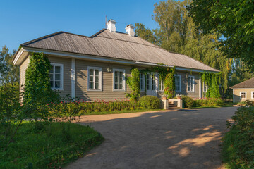 View of Mikhailovskoye estate of the Pushkin Museum-Reserve on a sunny summer day, Pushkinskiye...