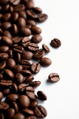 Dark roasted coffee beans scattered near chocolate pieces , stimulant, chunks, chocolate