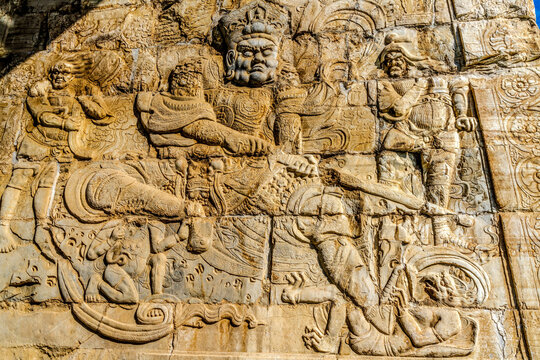 Guardian Deva carving Cloud Platform Arch, Great Wall, Juyong Pass, Beijing, China. Northern gateway to Beijing. Cloud Platform Buddhist Carvings Temple built 1342 and 1345.