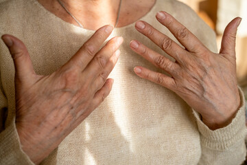Elderly woman hands. Senior old lady experiencing severe arthritis rheumatics pains, massaging,...