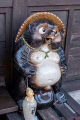Japanese racoon dog, Tanuki, symbol of prosperity, Takayama, Japan