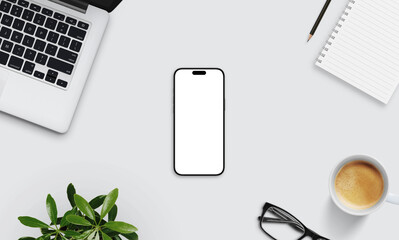 Smartphone mockup on light desk surrounded by laptop, notebook, coffee, glasses, and plant. Perfect...