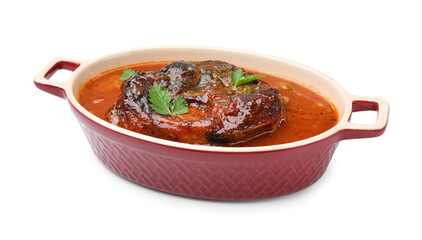Traditional ossobuco dish with beef steak and sauce isolated on white