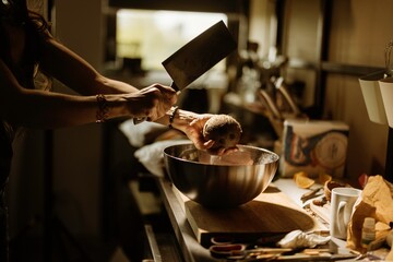 Hands skillfully craft exquisite cozonac decorations in a lively kitchen, showcasing colorful ingredients and the art of pastry preparation. Traditional baking techniques come alive