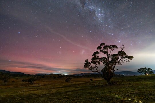 Stunning night sky with Milky Way and the faint glow of the Southern Lights (Aurora Australis) - Powered by Adobe