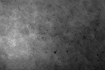 Grunge concrete wall in black and white with aged texture and spots