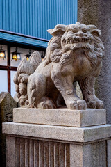 Stone lion, symbol of peace of tranquility, Kyoto, Japan