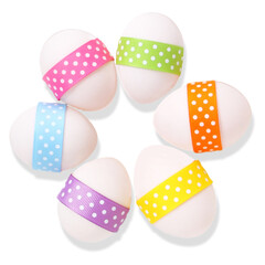 A colorful arrangement of decorated eggs with polka dot ribbons, symbolizing celebration and creativity.