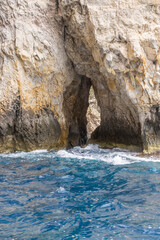 Malta, Blue Grotto. Blue waters of the Mediterranean seen from a tour boat.