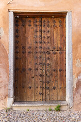 Albaicin, Province of Granada, Andalusia, Spain. An old wooden door.