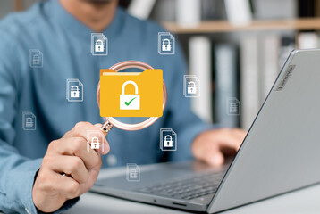 ิิbusinessman use Secure data management concept with using tablet. Locked digital folder and...
