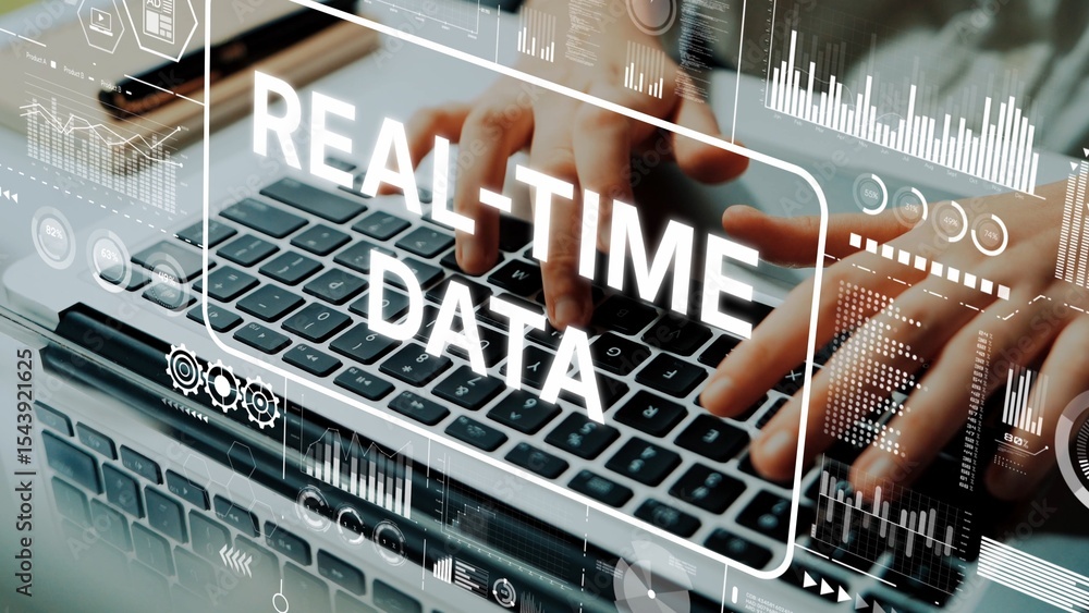 Poster hands typing on laptop with real-time data graphics displayed on screen, technology conceptual backg
