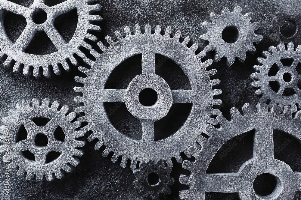 Poster interlocking metal gears mechanism - close-up of intricately designed metal gears interlocked, creat