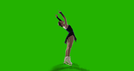Figure skating woman on green screen background.