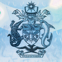 5 Dollars Solomon Islands. Polymer banknote fragment shows Tuna fish, coat of arms, issued 2019 ....