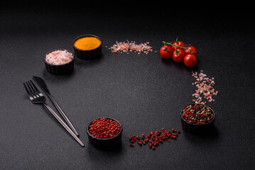 Ingredients for cooking cherry tomatoes, salt, spices and herbs