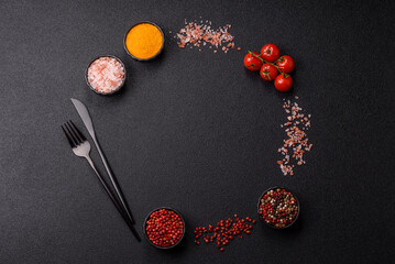 Ingredients for cooking cherry tomatoes, salt, spices and herbs