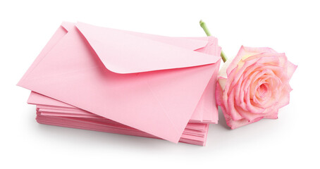 Stack of love letters and flower isolated on white