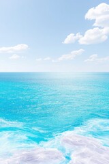 Fototapeta premium Ocean Horizon with Pale Blue Sky and Sparkling Water