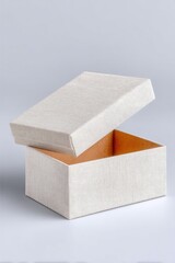 Open Grey Gift Box with Folded Card on Linen Texture Background