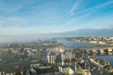 Discover the breathtaking charm of the Loire Valley as you gaze upon the historic town of Blois and its majestic castles
