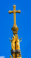 Fototapeta premium Golden Cross Angels Colorful, Albert Memorial, Kensington, London, England. Opened in 1872 after Prince Albert died at 42 years of age, Queen Victoria's husband.