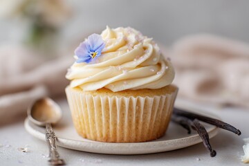 Vanilla Cupcake with Buttercream Frosting and Edible Flower – Soft Minimalist Dessert Styling