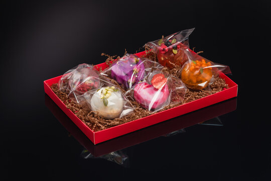 fruit berry tea in transparent balls and heart.