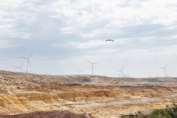 wind turbine in the desert,Danxia landform, Yadan landform