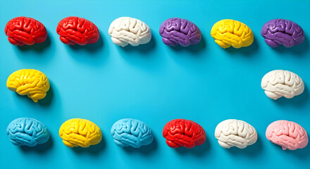 Obraz premium Multicolored brain halves on blue background symbolizing cognitive diversity and neurological balance, autism, ADHD