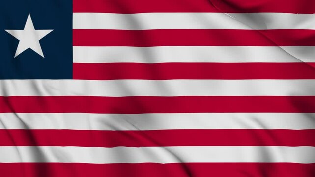 liberia national flag video waving in wind. Realistic flag background. Close up view, perfect loop, 4K footage.