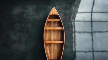 A beautifully crafted wooden canoe resting on still water, showcasing its classic design and smooth lines that reflect the natural surroundings, evoking tranquility.