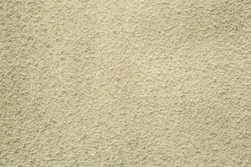 
Ukraine. Kyiv. 2025. Roughly plastered wall of gray color