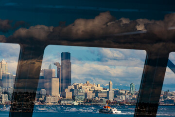 Ferry window views of the Seattle waterfront, Washington State, USA.