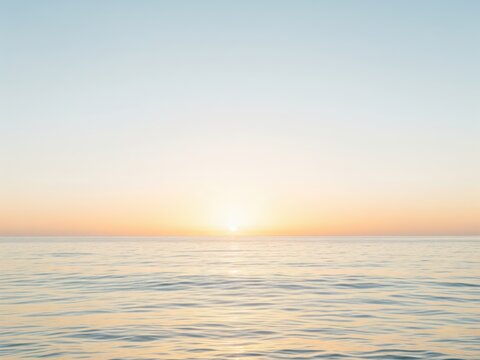 Minimalist ocean horizon at sunrise, calm water with gentle waves, sun reflecting on the surface, soft pastel blue and yellow tones, no objects or people