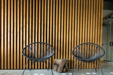 Two chairs standing next to each other in a spa salon.