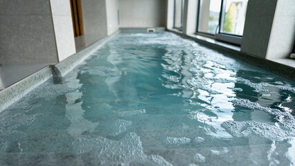 A small pool with bubbling water.