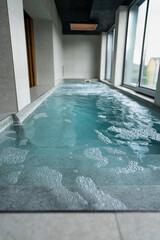 A tiny pool filled with bubbling water.