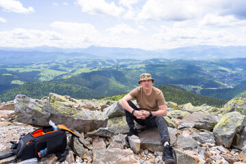 A tourist rests after climbing to the top.
