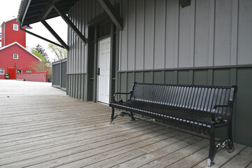 Exterior of an old railway station with grain silo