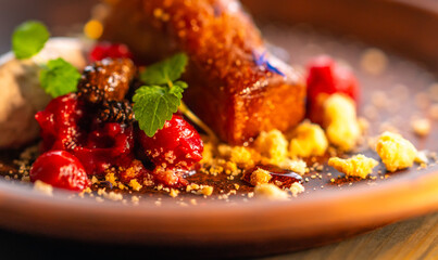 A cake dessert that has berries, honey, and whipped cream in it.