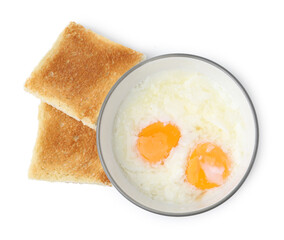 Half-boiled eggs in bowl and toasted bread isolated on white, top view. Traditional asian breakfast