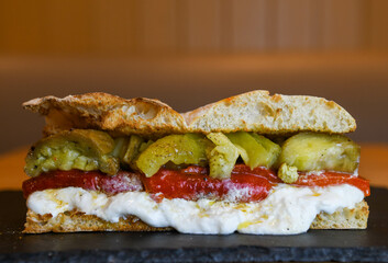 Ciabatta with roasted red pepper, burrata and pickles