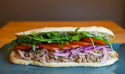 Gourmet Tuna Sandwich with Fresh Toppings on Artisan Bread