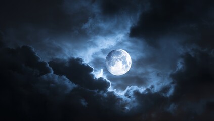 Fototapeta premium Dramatic Nightscape Full Moon Peeking Through Stormy Clouds