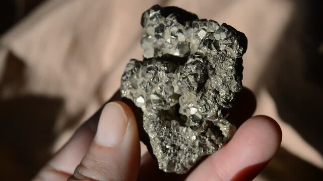 Pyrite mineral stone at sun 