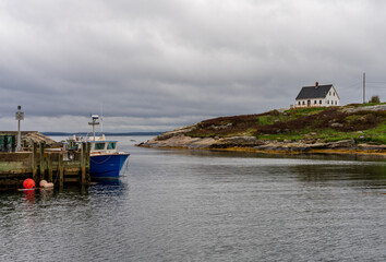 Rain keeps tourists away from the harbour of Peggys Cove near Halifax in Nova Scotia, Canada