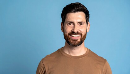 Happy man portrait with blue background.
