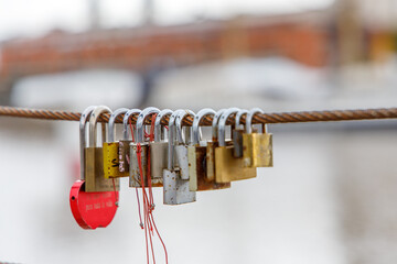 Closed padlocks on a bridge.