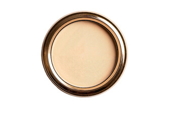 Round gold compact makeup case with cream foundation inside  